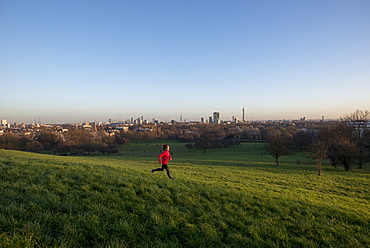 Lizzy Hawker, a world record holding extreme athlete, training on Primrose Hill, London, England, United Kingdom, Europe