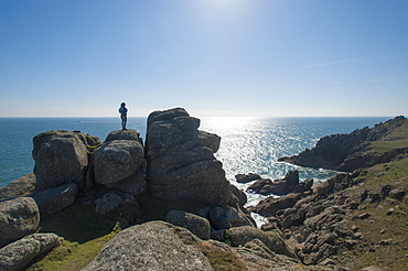 Standing near Logan Rock at the top of Treen Beach, Cornwall, the westernmost part of the British Isles, England, United Kingdom, Europe