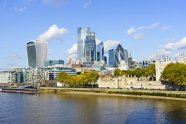 City of London skyscrapers and the Tower of London viewed across the River Thames, London, England, United Kingdom, Europe