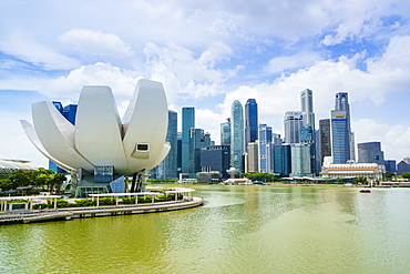 The lotus flower shaped ArtScience Museum overlooking Marina Bay and the financial district skyline, Singapore, Southeast Asia, Asia