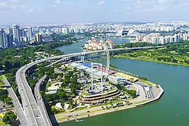 High view over Singapore with the Singapore Flyer ferris wheel and ECP expressway, Singapore, Southeast Asia, Asia