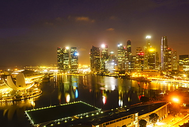 The towers of the Central Business District and Marina Bay by night, Singapore, Southeast Asia, Asia