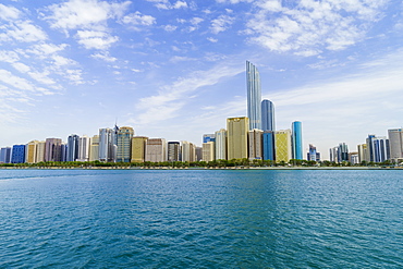 Skyscrapers in the Al Markaziyah district and Corniche viewed from the Gulf, Abu Dhabi, United Arab Emirates, Middle East