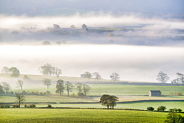 Mist rising over East Halton and Embsay in Lower Wharfedale, North Yorkshire, Yorkshire, England, United Kingdom, Europe