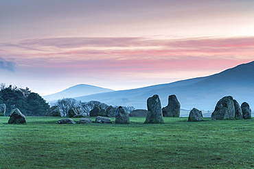 Sunrise over Castlerigg and St. John's in the Vale near Keswick, Lake District National Park, UNESCO World Heritage Site, Cumbria, England, United Kingdom, Europe