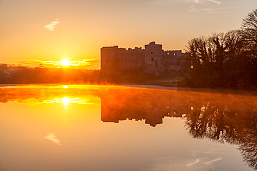 Carew Castle sunrise, Pembrokeshire, Wales, United Kingdom, Europe