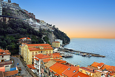 A view of waterfront buildings and harbour in the coastal town of Sorrento. Italy, Europe.