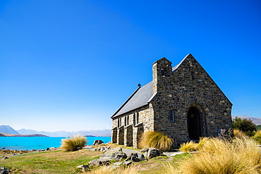 Church of the Good Shepherd, an old church overlooking turquoise blue Lake Tekapo, Tekapo, Mackenzie Distrtict, Canterbury Region, South Island, New Zealand, Pacific