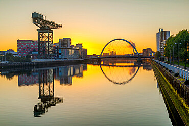 Sunrise over River Clyde, Finnieston Crane, Clyde Arc (Squinty) Bridge, Glasgow, Scotland, United Kingdom, Europe