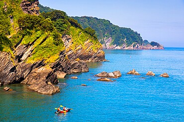 Kayakers and coastal view, Combe Martin, Exmoor National Park, North Devon, England, United Kingdom, Europe