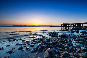 Portencross Beach and pier, Isle of Arran in background, Firth of Clyde, North Ayrshire, Scotland, United Kingdom, Europe