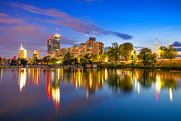 City Skyline at dusk, River Danube, Alte Donau, Vienna, Austria, Europe