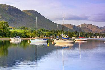 Boats at sunrise, Ullswater, Lake District National Park, UNESCO World Heritage Site, Cumbria, England, United Kingdom, Europe