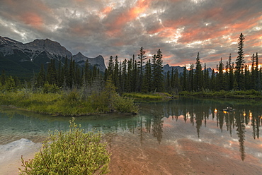 Sunset over Ha Ling Peak and Mount Rundle at Policeman's Creek, Canmore, Alberta, Canada, North America