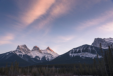 Evening light on the peaks of Three Sisters near Banff National Park, Canmore, Alberta, Canadian Rockies, Canada, North America