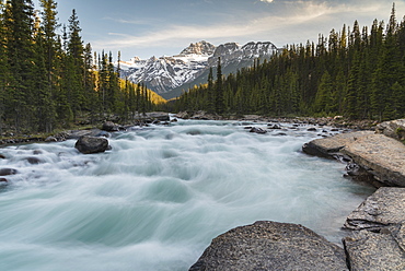 Mistaya Canyon waterfalls at sunset with evening light and Mount Sarbach, Banff National Park, UNESCO World Heritage Site, Alberta, Canadian Rockies, Canada, North America