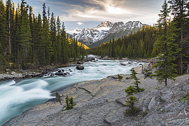 Mistaya Canyon waterfalls at sunset with evening light and Mount Sarbach, Banff National Park, UNESCO World Heritage Site, Alberta, Canadian Rockies, Canada, North America