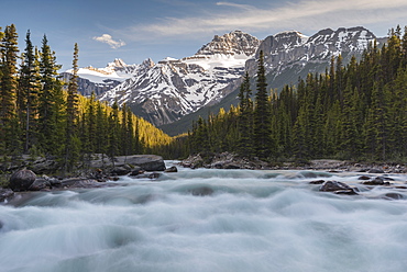 Mistaya Canyon waterfalls at sunset with evening light and Mount Sarbach, Banff National Park, UNESCO World Heritage Site, Alberta, Canadian Rockies, Canada, North America