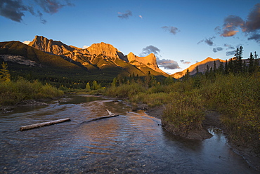 Sunrise and Alpenglow on Mount Lawrence Grassi and Ha Ling Peak in autumn, Canmore, Alberta, Canadian Rockies, Canada, North America