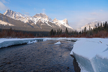 Policeman's Creek in winter with Ha Ling Peak at sunrise, Bow Valley Provincial Park, Canmore, Canadian Rockies, Alberta, Canada, North America