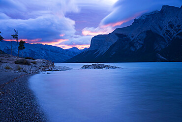 Storm over Mount Inglismaldie and Lake Minnewanka at sunrise, Banff National Park, UNESCO World Heritage Site, Alberta, Canadian Rockies, Canada, North America