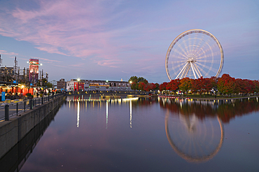 Ferris Wheel at La Grande Roue de Montreal at sunset, Old Port of Montreal, Quebec, Canada, North America