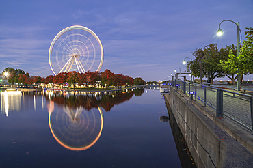 Ferris Wheel at La Grande Roue de Montreal at sunset, Old Port of Montreal, Quebec, Canada, North America