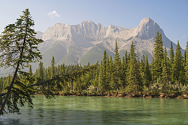 The bow river and Ha Ling Peak in wildfire smoke, Canmore, Canadian Rockies, Alberta