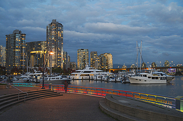 False Creek pedestrian waterfront in Autumn, Yaletown Neighbourhood, Downtown Vancouver, British Columbia, Canada