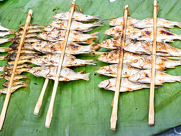 Grilled river fish from an outdoor market, Nong Khiaw, Laos, Indochina, Southeast Asia, Asia