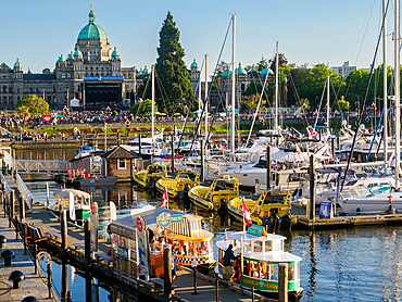 Moored boats and little water taxis in the Inner Harbor, Victoria, Vancouver Island, British Columbia, Canada, North America