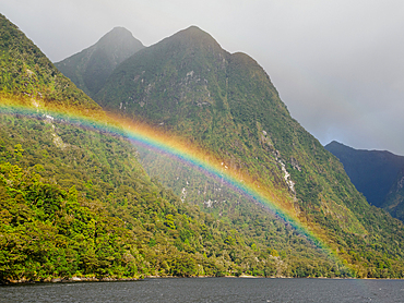 Rainbow over the fjord of Doubtful Sound, Fiordland National Park, Te Wahipounamu, UNESCO World Heritage Site, South Island, New Zealand, Pacific