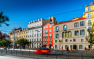 Traditional buildings with azulejo tiles in the old Lisbon neighbourhood of Alfama with Se Cathedral in background, Lisbon, Portugal, Europe