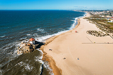 Aerial view of Senhor da Pedra, an 18th century Baroque chapel on Miramar Beach, northern Portugal, Europe