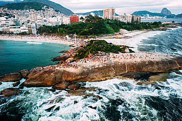 Aerial drone view of Arpoador Rock in Ipanema Beach, with Praia Vermelha visible on right, Rio de Janeiro, Brazil, South America