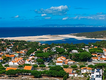 The Lagoa de Albufeira, a picturesque lagoon opening out on a beautiful beach, the Praia da Lagoa de Albufeira, Costa da Caparica coastline, Portugal, Europe