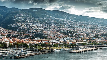 Funchal is the capital city of Portugal's Madeira archipelago. It's backed by hills, and known for its harbor, gardens and Madeira wine cellars