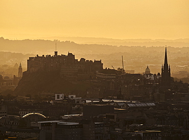 Holyrood Park, sunset over the city of Edinburgh viewed from the top of the Arthur's Seat, Edinburgh, Lothian, Scotland, United Kingdom, Europe