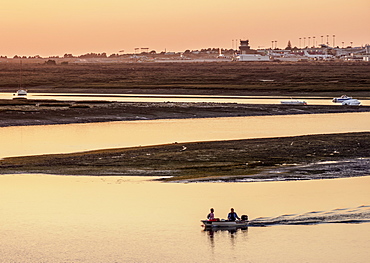 View towards Ria Formosa Natural Park at sunset, Faro, Algarve, Portugal, Europe