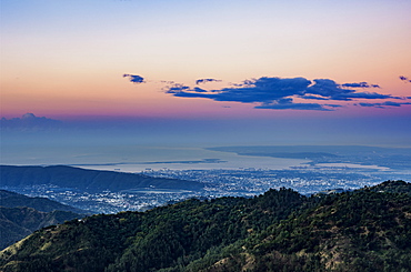 View over Blue Mountains towards Kingston at dawn, Saint Andrew Parish, Jamaica, West Indies, Caribbean, Central America