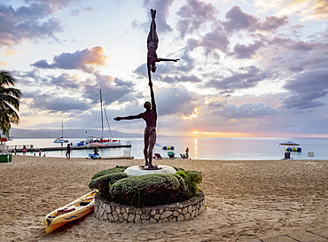 Statue Balance by Basil Watson at sunset, Doctor's Cave Beach, Montego Bay, Saint James Parish, Jamaica, West Indies, Caribbean, Central America