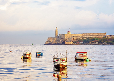 Fishing Boats and El Morro Castle at sunrise, Havana, La Habana Province, Cuba, West Indies, Central America