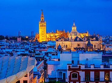 View from Metropol Parasol towards The Church of the Divine Savior and The Cathedral at dusk, Seville, Andalusia, Spain, Europe