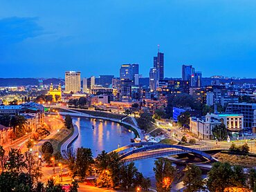 View over Neris River towards Snipiskes, New City Centre, dusk, Vilnius, Lithuania