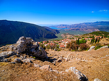 View over Delphi Town and Pleistos River Valley towards the Gulf of Corinth, Delphi, Phocis, Greece, Europe