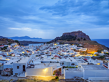 View over Lindos village towards the Acropolis at dawn, Rhodes Island, Dodecanese, Greek Islands, Greece, Europe