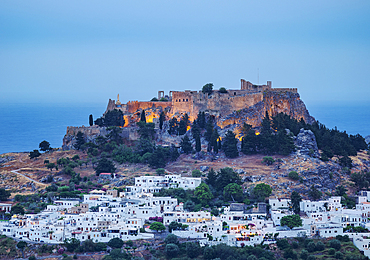 View towards the Acropolis of Lindos at dusk, Rhodes Island, Dodecanese, Greek Islands, Greece, Europe