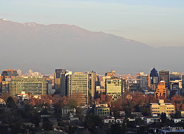 View from the Parque Metropolitano towards the high rise buildings in the financial sector, with the Andes behind, Santiago, Chile, South America