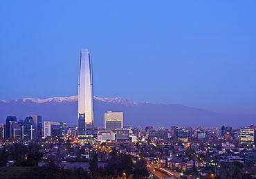 Twilight view from the Parque Metropolitano towards the high rise buildings and Costanera Center Tower, Santiago, Chile, South America