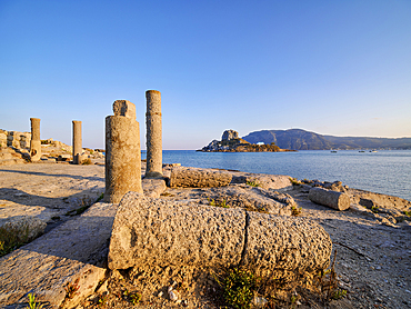 St. Stefanos Basilica Ruins and Kastri Island at sunset, Agios Stefanos Beach, Kos Island, Dodecanese, Greek Islands, Greece, Europe